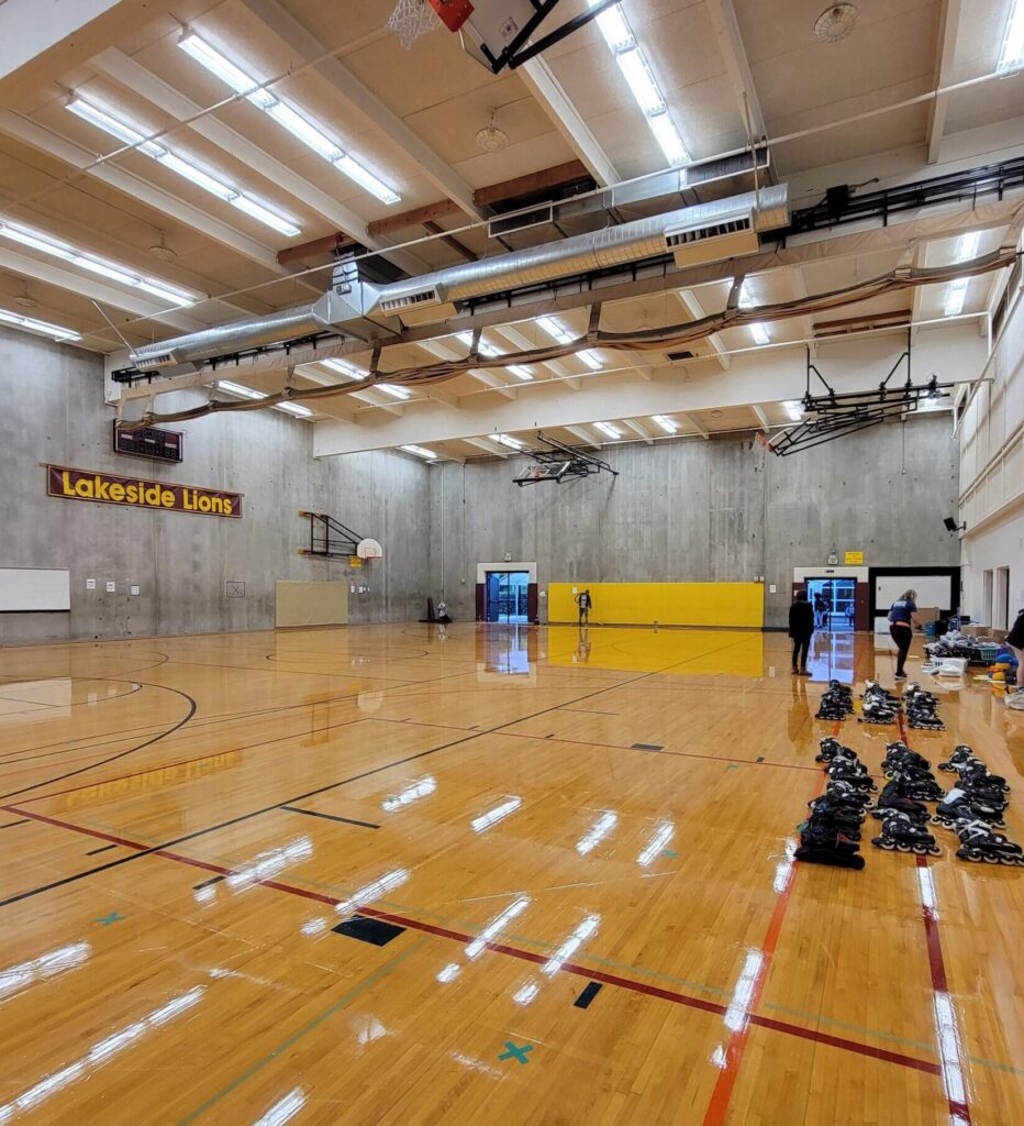 Empty basketball court with rollerblades.