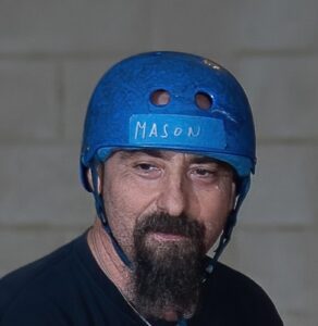 Man with blue helmet named Mason.