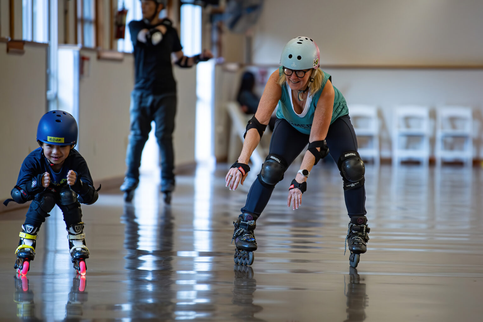 Instructor and student on Inline skates