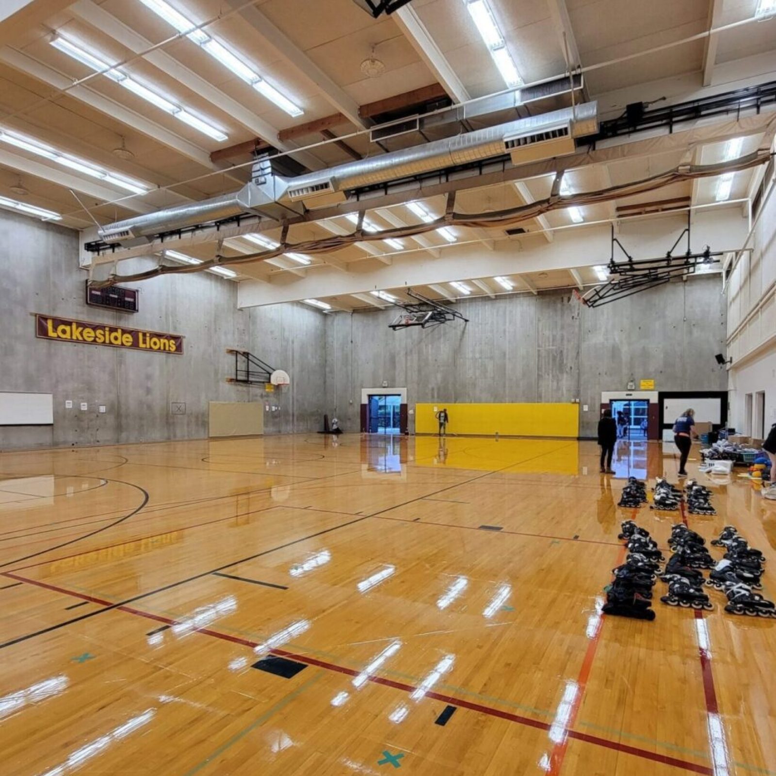 Empty basketball court with rollerblades.